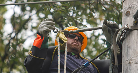 Consumers energy worker at a line